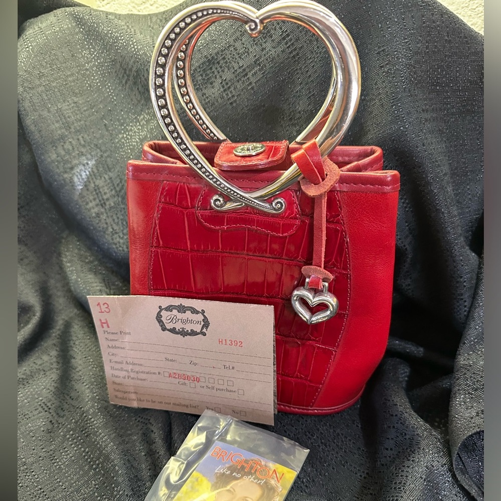Brighton leather bag sterling silver handle. This bag is registered, brand new!